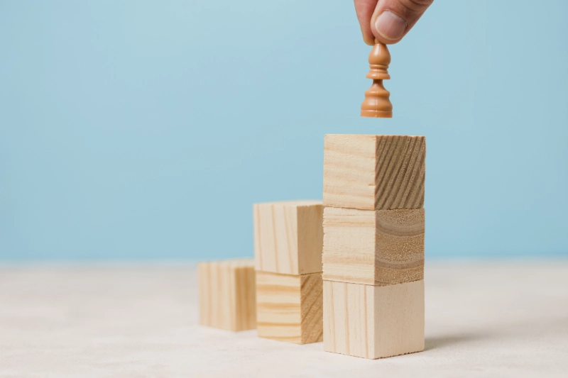 businessman-using-wooden-pieces eCommerce client wants to bolster their brand presence on social media.